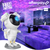 Cartoon astronaut figure standing in a purple-lit bedroom with a galaxy projector glow, promoting an astronaut galaxy projector